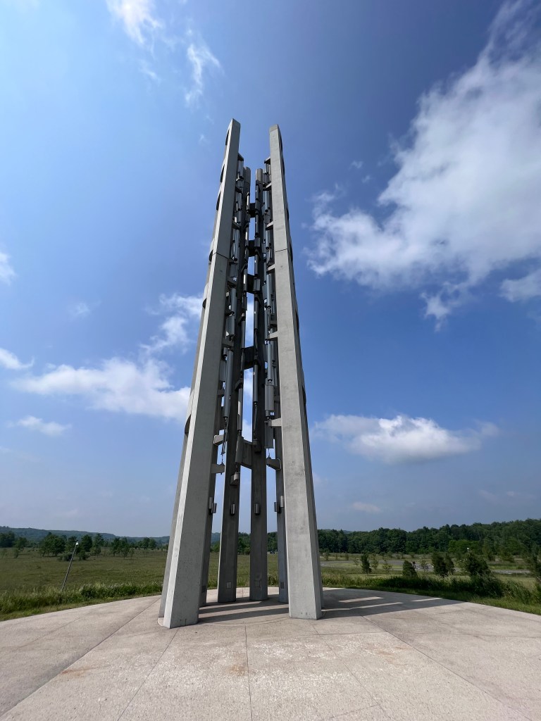 A closer view of the Tower of Voices which is 93 feet tall and houses 40 wind chimes within the structure.