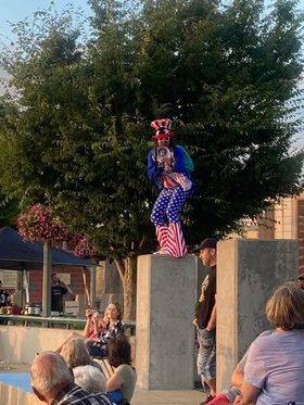 Lead singer of M.F.B., Funkle Sam, shouts with his megaphone during Monday's musical performance. 