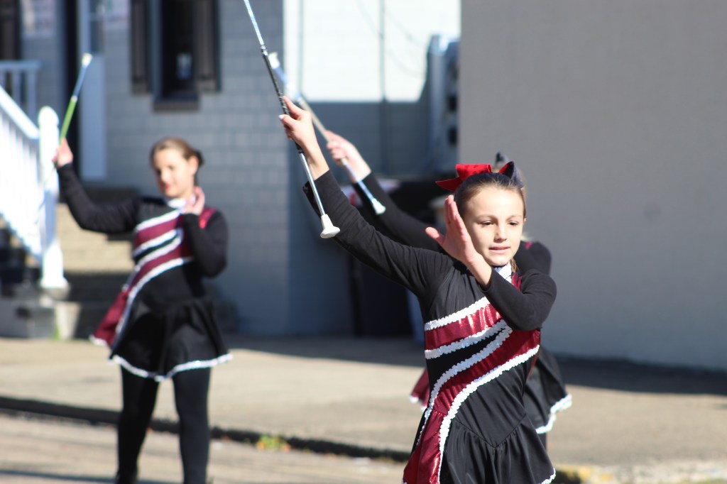 Young twirlers along the route.
